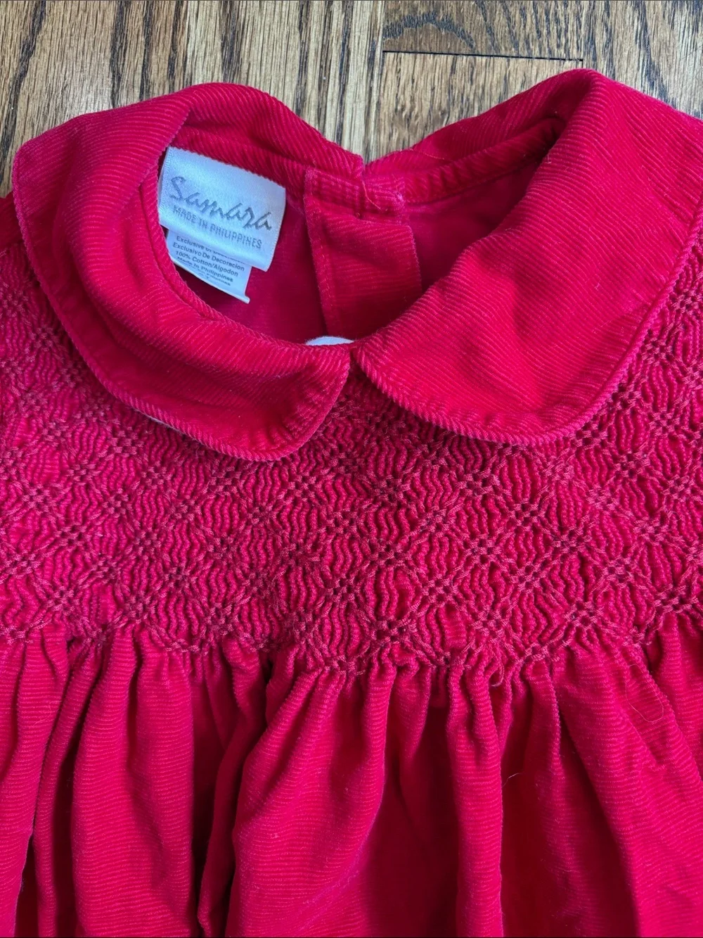Red lightweight corduroy Samara smocked dress, size 2T. Like new condition